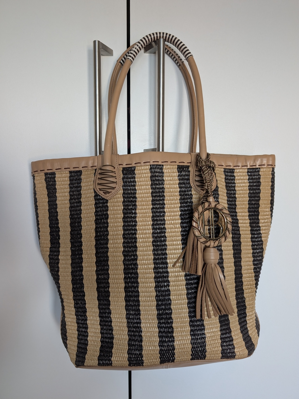 Henri Bendel Striped Straw Tote Bag with Tassel Accent - Tan & Black